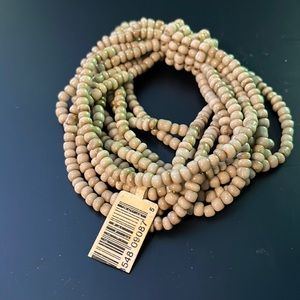 New knot trace cream bracelet.